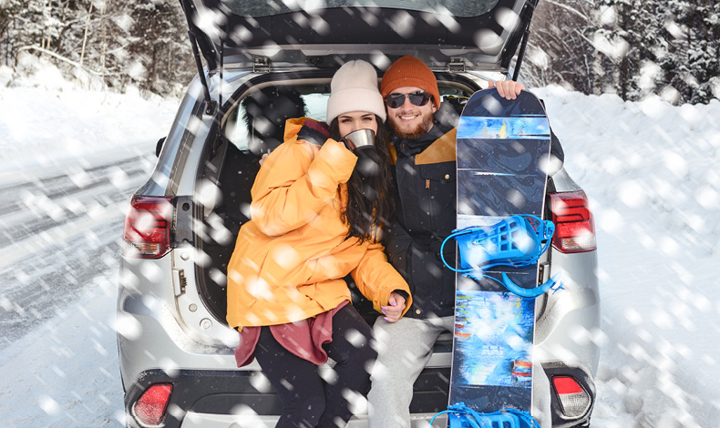 Snowboard Couple In Car